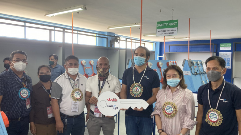 AL Navarro NHS. Davao Light heads turn over the key to the refurbished EIM laboratory in AL Navarro National High School to DepEd and LGU officials.