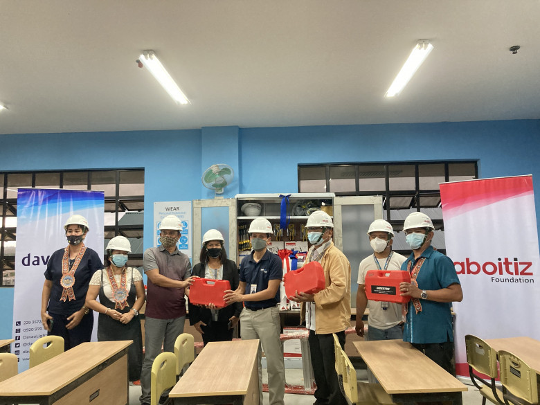 DEBNHS. DepEd officials received the donated electrical tools and equipment from Davao Light at Don Enrique Bustamante National High School.