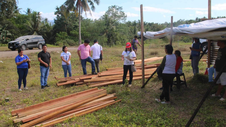 8 families affected  by flooding in Mati City receive bldg. materials
